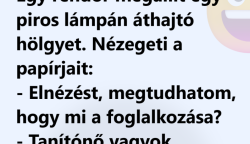 Vicc:Egy rendőr megállít egy piros lámpán áthajtó hölgyet